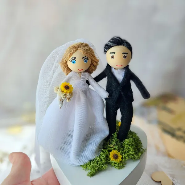 Bride and groom cake-topper dolls