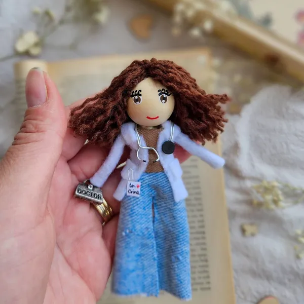 Doctor doll with a white coat