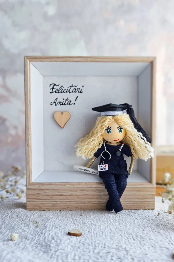 Framed doctor doll with a personal message