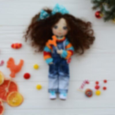 Handmade doll with tangerines, grapefruit & spruce branches