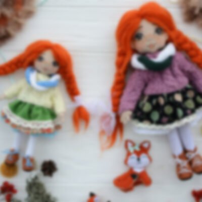 Textile red hair dolls with different small stuff