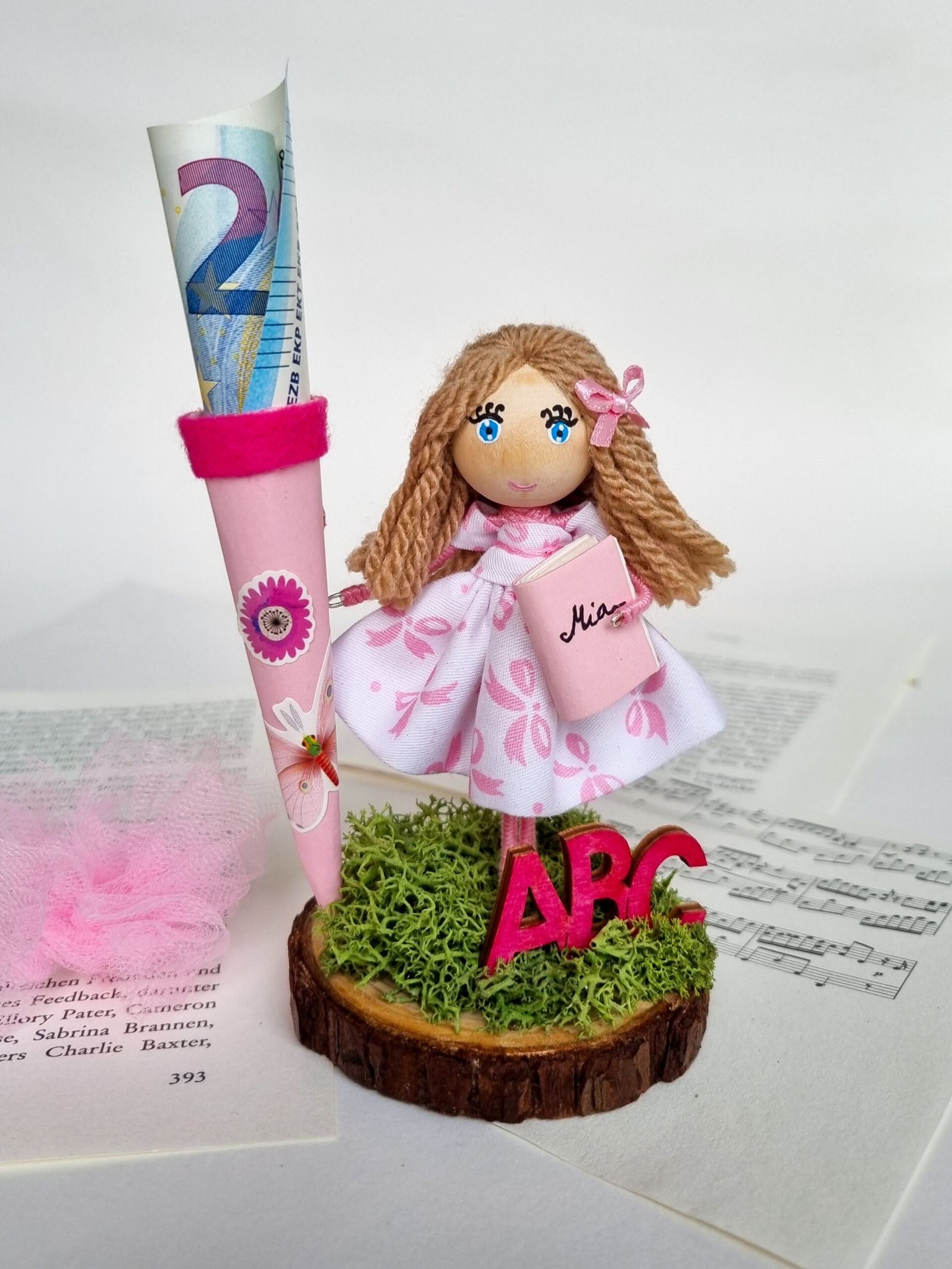 Handmade doll in bright clothes with natural hair